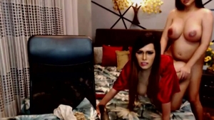 Two cute shemales Cumming Hard On cam